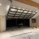 R&Y technician performing a garage door inspection and maintenance check in Taylor, TX