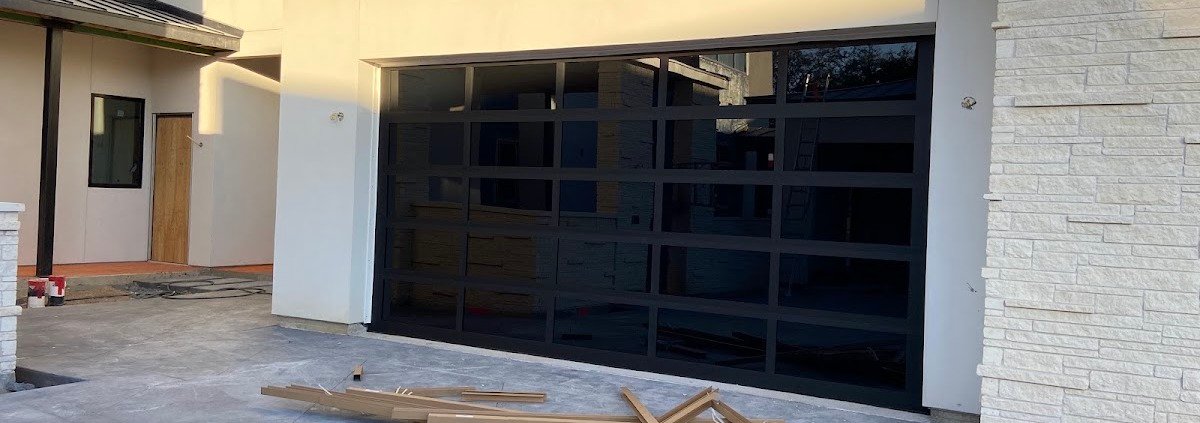 Modern glass garage door installed by R&Y Garage Door Repair