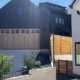 Wood carriage-style garage door, wide view, R&Y Garage Door Repair