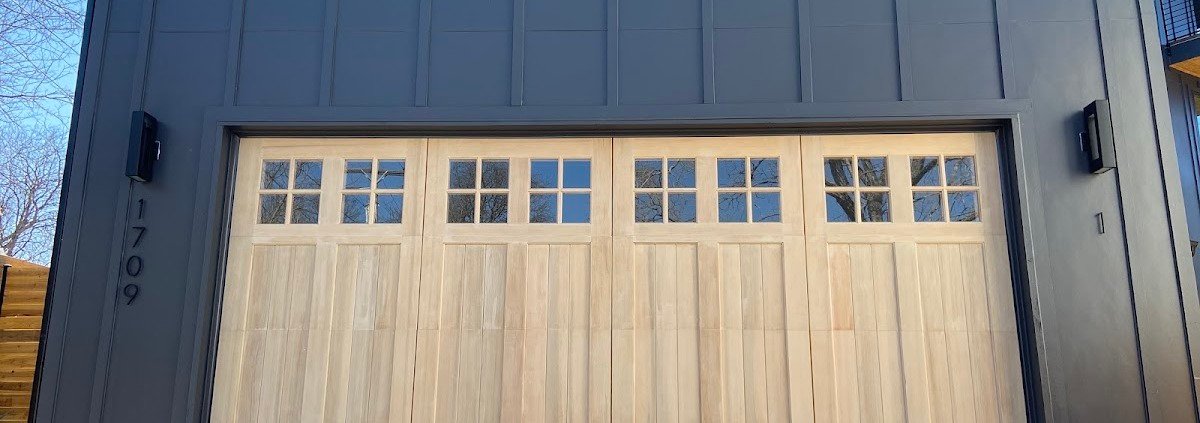 Wood carriage-style garage door installed by R&Y Garage Door Repair