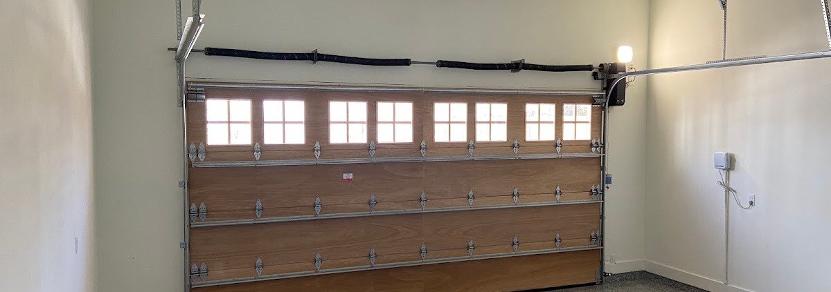 Wood panel garage door interior view, installed by R&Y Garage Door Repair