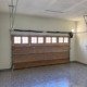 Wood panel garage door interior view, installed by R&Y Garage Door Repair